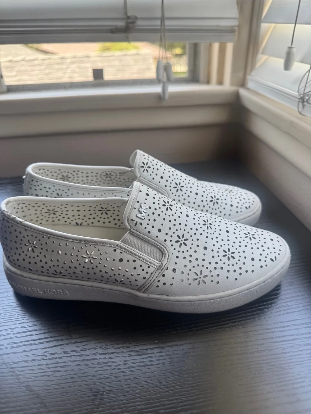Michael Kors White Perforated Slip-On Sneakers with Floral Cutouts